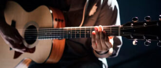 How to Properly String an Acoustic Guitar: Learn in 9 Steps!